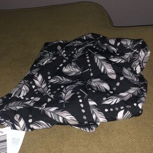 Black and gray tunic feather pattern